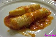 Quenelles en gratin, sauce tomate, parmesan